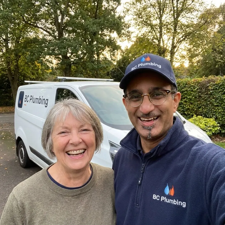VJ from BC Plumbing with Janet, a happy customer in Tipton