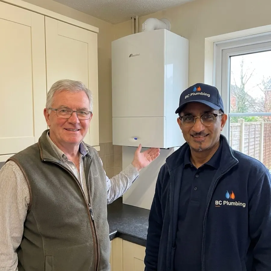 VJ from BC Plumbing with Mark, a happy customer in Walsall